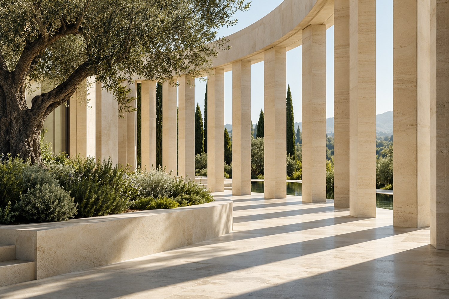 Sunlit stone colonnade with a mature tree integrated into its architecture